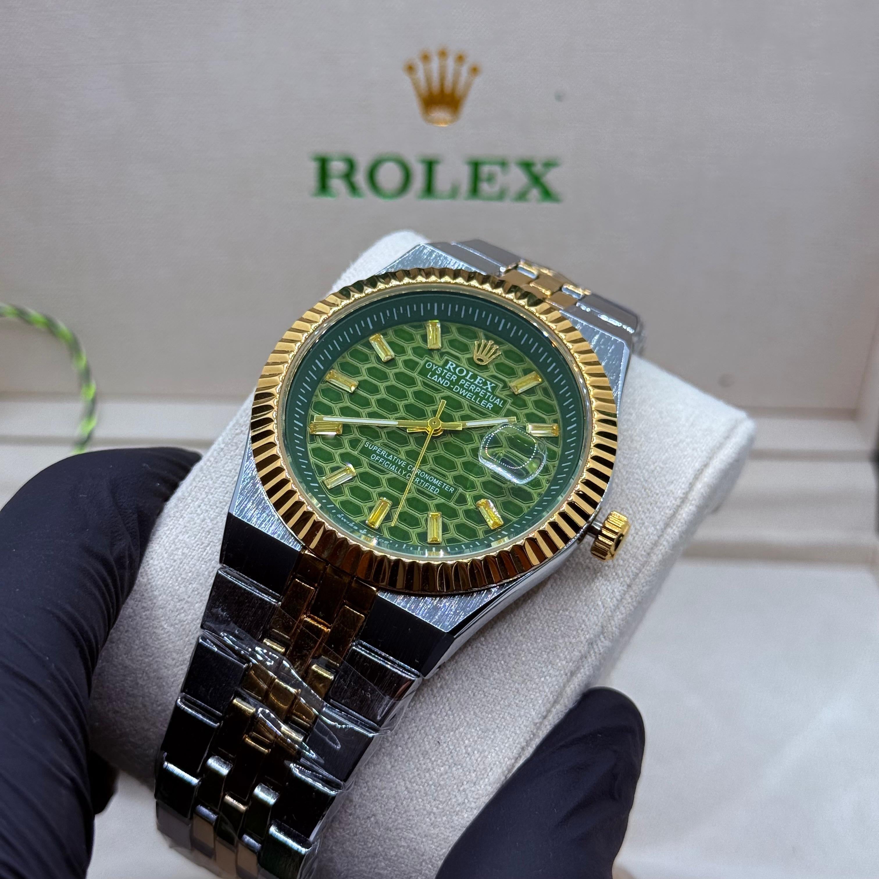Rolex land dweller truetone with green dial