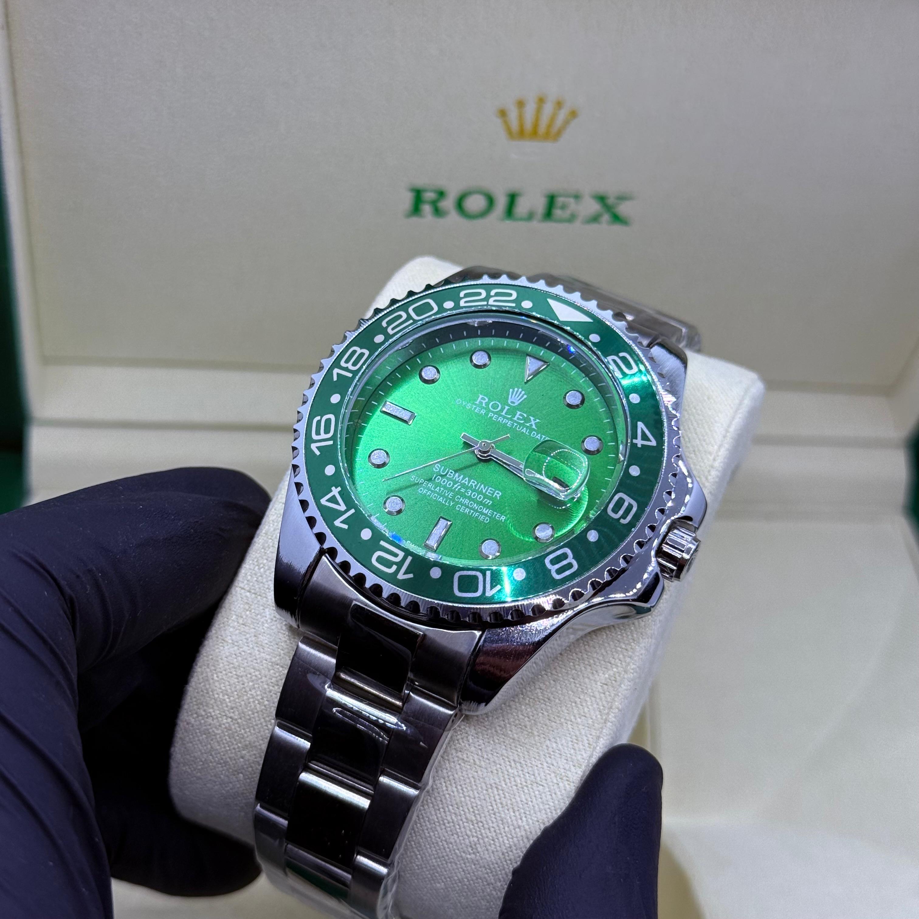 Rolex Submariner green rotating dial with master lock