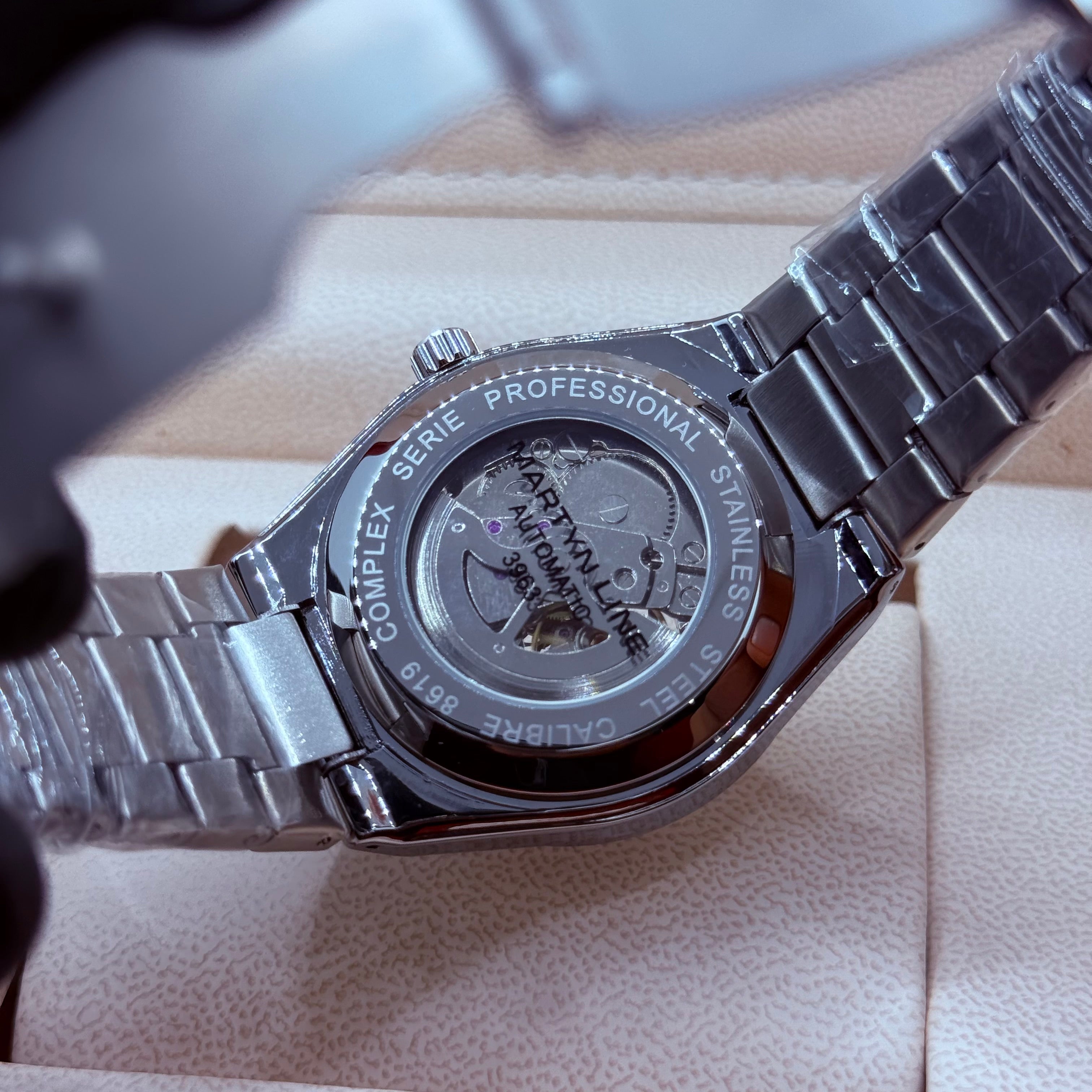 Automatic skeleton black dial with silver chain